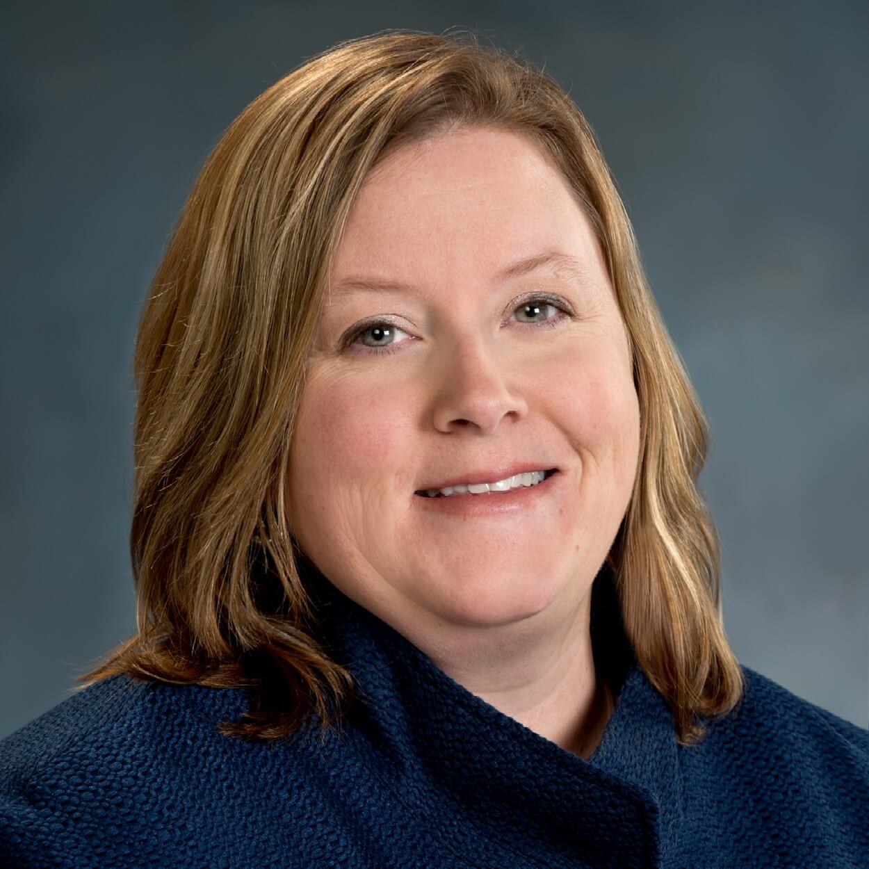 Professional headshot of Laura Nelson, Chief Operating Officer.