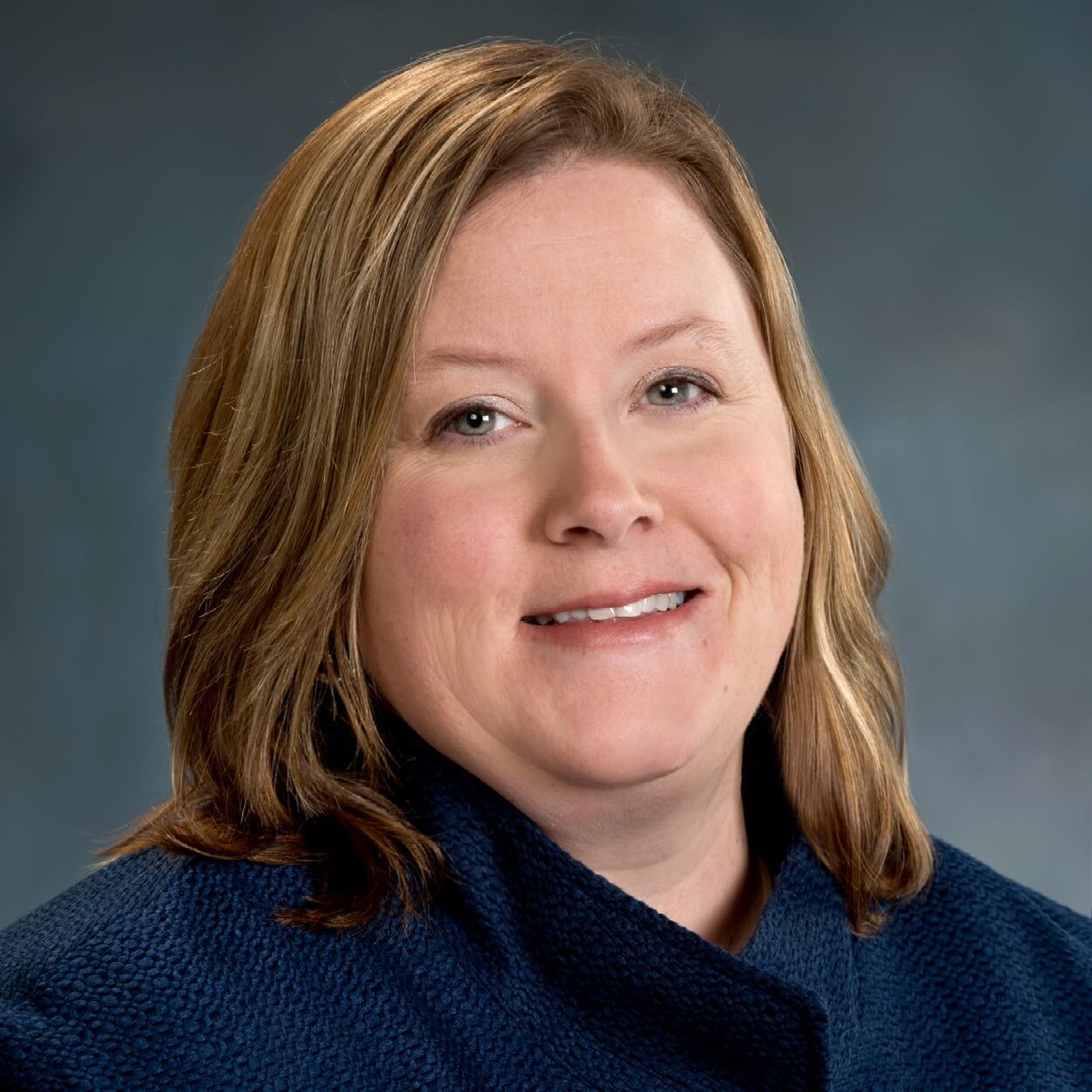Professional headshot of Laura Nelson, Chief Operating Officer.