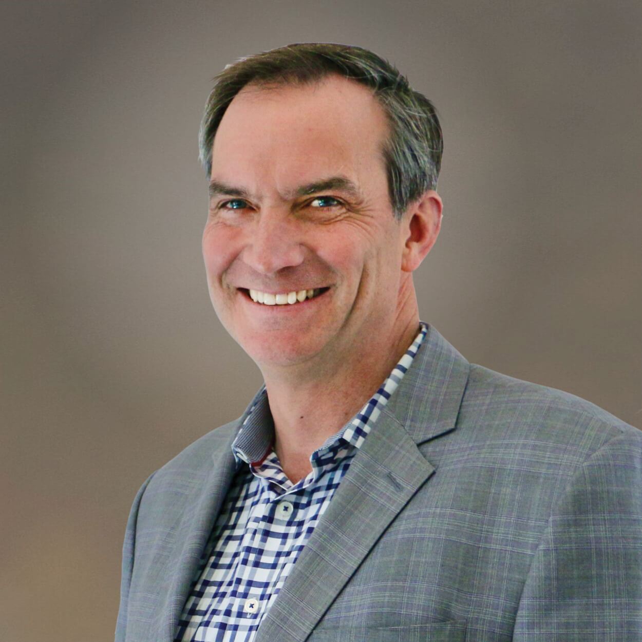 Professional headshot of Matthew Brown, Co-Chair and Founder.